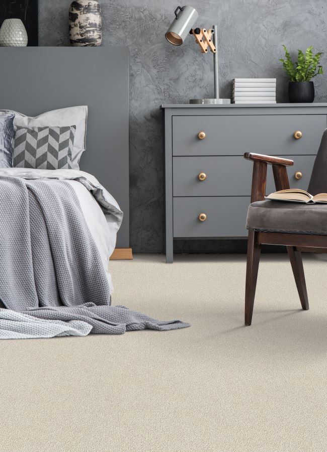 beige carpet in a stylish grey bedroom